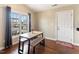 Bright dining area with modern table set and large window overlooking the yard at 2425 Shreve Rd, Rocky Mount, NC 27801