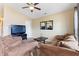 A comfy living room with plush couches and a ceiling fan at 2425 Shreve Rd, Rocky Mount, NC 27801