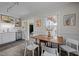 Bright dining room with neutral decor, and natural light at 2511 State St, Durham, NC 27704