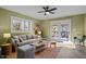 Charming living room with access to a private deck and open to dining area at 2511 State St, Durham, NC 27704