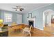 Inviting living room with fireplace, hardwood floors, and a comfortable seating area at 2511 State St, Durham, NC 27704