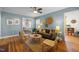 Cozy living room with hardwood floors, comfortable seating and decor at 2511 State St, Durham, NC 27704