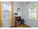Cozy office nook with natural light, built-in shelves, and views of the surrounding neighborhood at 2511 State St, Durham, NC 27704