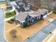 Beautiful dark blue home with a large driveway and well-maintained landscaping in a quiet neighborhood at 27 Ellen Cir, Clayton, NC 27527