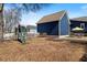 Large backyard with a playground and grassy area, perfect for Gathering fun and recreation at 27 Ellen Cir, Clayton, NC 27527