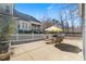 View of the backyard patio with table and chairs set, perfect for outdoor entertaining with privacy fence at 27 Ellen Cir, Clayton, NC 27527