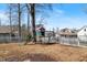 Large backyard with a playground and grassy area, perfect for Gathering fun and recreation at 27 Ellen Cir, Clayton, NC 27527