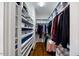 Organized walk-in closet features custom shelving and hanging space for optimal storage at 27 Ellen Cir, Clayton, NC 27527