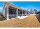 Backyard view shows a screened porch and yard area at 276 Bevis Marks Dr, Fuquay Varina, NC 27526