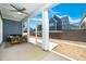Screened-in porch with seating and a view of the fenced backyard at 276 Bevis Marks Dr, Fuquay Varina, NC 27526
