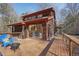 Spacious wood deck with sliding door access to the home and wooded view at 279 Box Turtle Trl, Chapel Hill, NC 27516