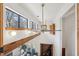 Bright, open living room with hardwood floors, vaulted ceilings, and a brick fireplace, viewed from above at 279 Box Turtle Trl, Chapel Hill, NC 27516