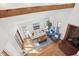 Bright living room features wood floors, large windows, comfortable seating, and a cozy fireplace at 279 Box Turtle Trl, Chapel Hill, NC 27516