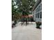The backyard patio has outdoor seating, a garden view, and a well-maintained lawn, ideal for outdoor living at 2851 Wilkes Lake Dr, Fuquay Varina, NC 27526