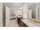 Bright bathroom features double vanity with granite counters and bedroom view at 2851 Wilkes Lake Dr, Fuquay Varina, NC 27526