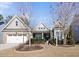 Charming single-Gathering home with brick accents, two car garage, and landscaped front yard at 2851 Wilkes Lake Dr, Fuquay Varina, NC 27526