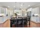 Bright kitchen featuring white cabinets, granite counters, stainless appliances, and a center island at 2851 Wilkes Lake Dr, Fuquay Varina, NC 27526
