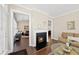 Inviting living area with fireplace, hardwood floors, and open layout at 2851 Wilkes Lake Dr, Fuquay Varina, NC 27526