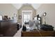 Home office featuring a vaulted ceiling and large window providing plenty of natural light at 2851 Wilkes Lake Dr, Fuquay Varina, NC 27526