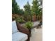 Relaxing patio with comfortable seating and lush greenery, perfect for outdoor enjoyment at 2851 Wilkes Lake Dr, Fuquay Varina, NC 27526