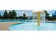 Community pool with a unique fountain feature and a slide, perfect for Gathering fun at 2851 Wilkes Lake Dr, Fuquay Varina, NC 27526