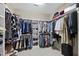 Spacious walk-in closet with ample storage for clothing, shoes and accessories at 2851 Wilkes Lake Dr, Fuquay Varina, NC 27526