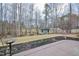 Backyard and shed, framed by trees, and ready for outdoor activities and relaxation at 290 Silver Creek Dr, Clayton, NC 27520