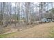 Spacious backyard with a large wooded area at 290 Silver Creek Dr, Clayton, NC 27520