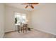 Bedroom featuring carpet, natural light, and a small desk at 290 Silver Creek Dr, Clayton, NC 27520