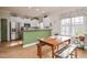 Dining Area adjacent to a bright kitchen with natural lighting and modern fixtures at 290 Silver Creek Dr, Clayton, NC 27520