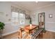 Charming dining area with ample light, cozy seating, and view to outside at 290 Silver Creek Dr, Clayton, NC 27520