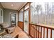 Relaxing screened porch with comfortable seating, offering serene views of the backyard at 290 Silver Creek Dr, Clayton, NC 27520