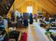 Unfinished attic space in need of decluttering and organization at 2907 Jakes View Pt, Fuquay Varina, NC 27526