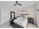 This bedroom has carpet, a ceiling fan, and soft natural light at 2907 Jakes View Pt, Fuquay Varina, NC 27526