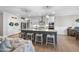 Bright kitchen with large island, granite countertops, and stainless steel appliances at 2907 Jakes View Pt, Fuquay Varina, NC 27526