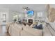 Cozy living room featuring a fireplace, built-in shelving, and a comfortable couch at 2907 Jakes View Pt, Fuquay Varina, NC 27526