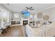 Comfortable living room with a fireplace, built-in shelves, and natural light at 2907 Jakes View Pt, Fuquay Varina, NC 27526