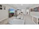 Spacious living room features plush seating, a large TV, and plenty of room for relaxation and entertainment at 2907 Jakes View Pt, Fuquay Varina, NC 27526