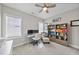 This home office has natural light, built in shelving, and plush carpet at 2907 Jakes View Pt, Fuquay Varina, NC 27526