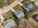 An aerial view shows the roof, yard and neighborhood streets surrounding this well maintained home at 3003 Cregler Dr, Apex, NC 27502