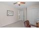 Spare bedroom features a ceiling fan, closet, and neutral colors and makes an ideal home office or study at 3003 Cregler Dr, Apex, NC 27502