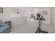 Carpeted bonus room with exercise bike and sitting area at 3003 Cregler Dr, Apex, NC 27502