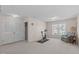 Bonus room featuring carpet, exercise bike, large window, and closet at 3003 Cregler Dr, Apex, NC 27502