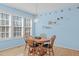 Well-lit breakfast nook featuring a round wood table and large window at 3003 Cregler Dr, Apex, NC 27502