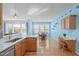 Spacious kitchen with stainless steel appliances, granite countertops, and adjacent dining area at 3003 Cregler Dr, Apex, NC 27502