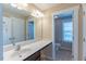 Bathroom featuring a large vanity with ample counter space and access to the toilet and shower at 319 Brinkley Cir, Mebane, NC 27302