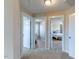 Bright hallway showcasing access to a bedroom and bathroom, creating a seamless flow throughout the home at 319 Brinkley Cir, Mebane, NC 27302