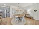 Charming dining area with a round table, stylish chairs, and decorative wall art at 3408 Dropseed Dr, Apex, NC 27502