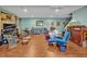 Large finished basement with hardwood floors, comfortable seating, and plenty of space for entertainment at 363 Rolling Meadows Ln, Chapel Hill, NC 27517