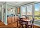 Cozy breakfast nook with natural light, cabinetry, and a charming view of the wooded lot at 363 Rolling Meadows Ln, Chapel Hill, NC 27517